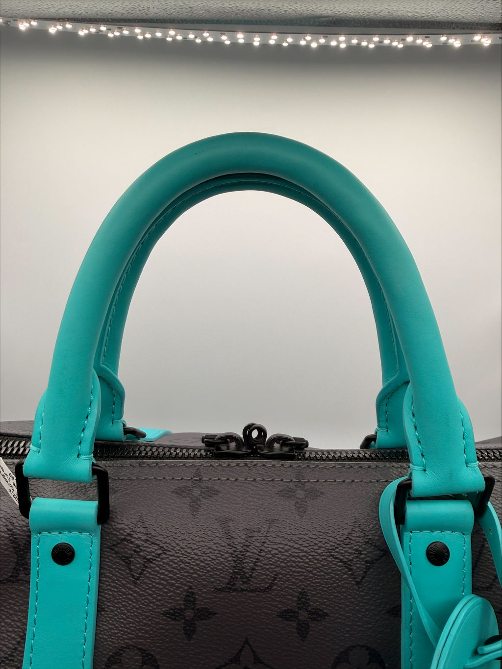 Louis Vuitton Keepall Bandoulière Duffle — Monogram Eclipse Canvas with Teal Trim