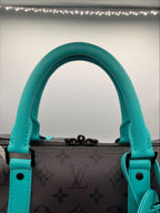 Louis Vuitton Keepall Bandoulière Duffle — Monogram Eclipse Canvas with Teal Trim