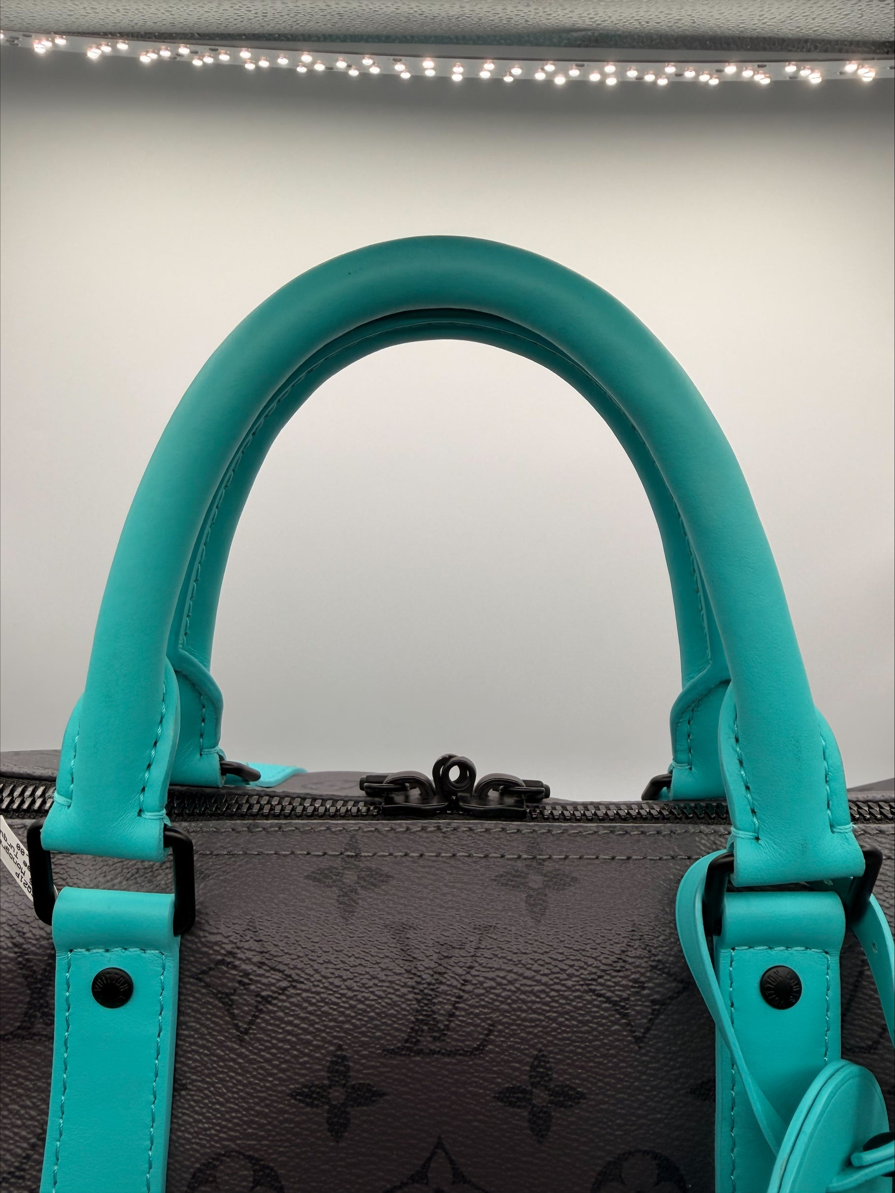 Louis Vuitton Keepall Bandoulière Duffle — Monogram Eclipse Canvas with Teal Trim